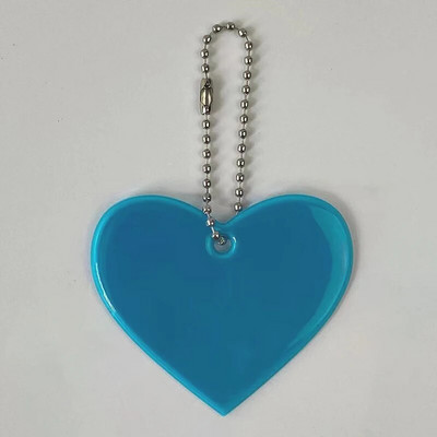 Ανακλαστικό μενταγιόν Τσάντες μπρελόκ σχήμα καρδιάς Αξεσουάρ Ψηλά ορατοί ανακλαστήρες PVC Μπρελόκ Σακίδια πλάτης για γυναικεία Παιδιά Χρηματοκιβώτιο