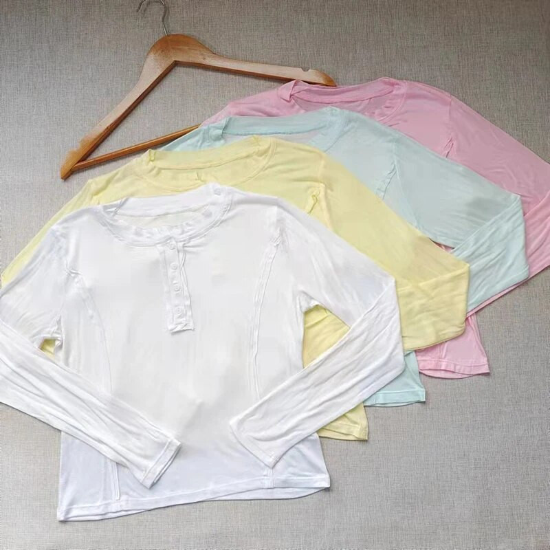 Disainitundeline varasügisene fitness-jakk mood pikkade varrukatega ühevärviline põhjaga spordi- ja vabaaja jooga T-särk.