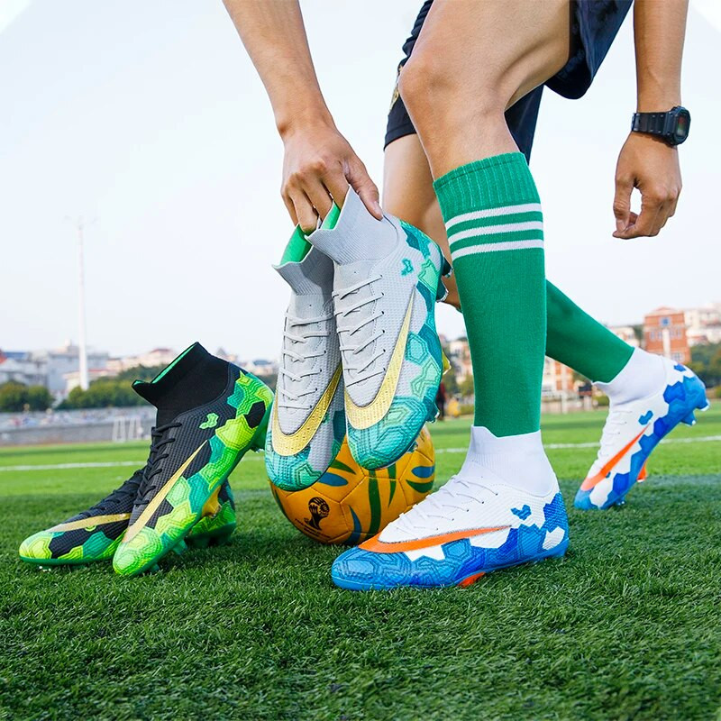 Futsal Jalgpallisaapad Meeste Teismeliste Jalgpallijalatsid Professionaalsed Matš TF/FG Libisemisvastane treening Kõrge ülaosaga klambrid jalatsid Täiskasvanute 2023