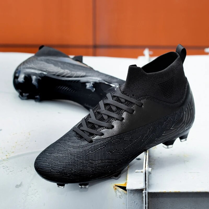 Libisemisvastased jalgpallijalatsid Meeste kõrge ülaosaga jalgpallisaapad Poiste FG/TF professionaalsed treeningjalatsid Laste välijalgpalliklambrid 2023 Uus