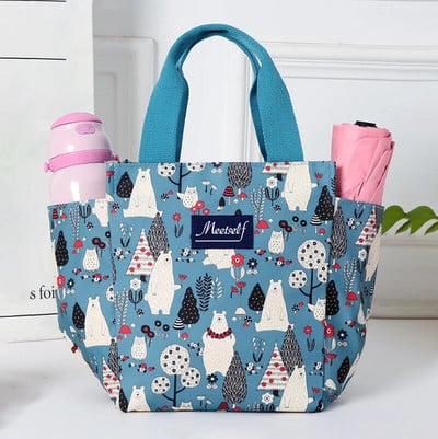 Administratívni pracovníci idú von s taškou na obed s ryžou, termo taškou bento, módnou plátennou taškou na prenášanie v ruke s taškou pre mamičky.