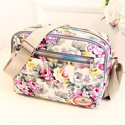 Moodne lilleline mitmevärviline prinditud lõuend Naiste käekott Trend õlakott Nailonist vabaaja kott Vanema kingitus