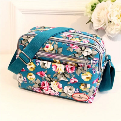 Moodne lilleline mitmevärviline prinditud lõuend Naiste käekott Trend õlakott Nailonist vabaaja kott Vanema kingitus