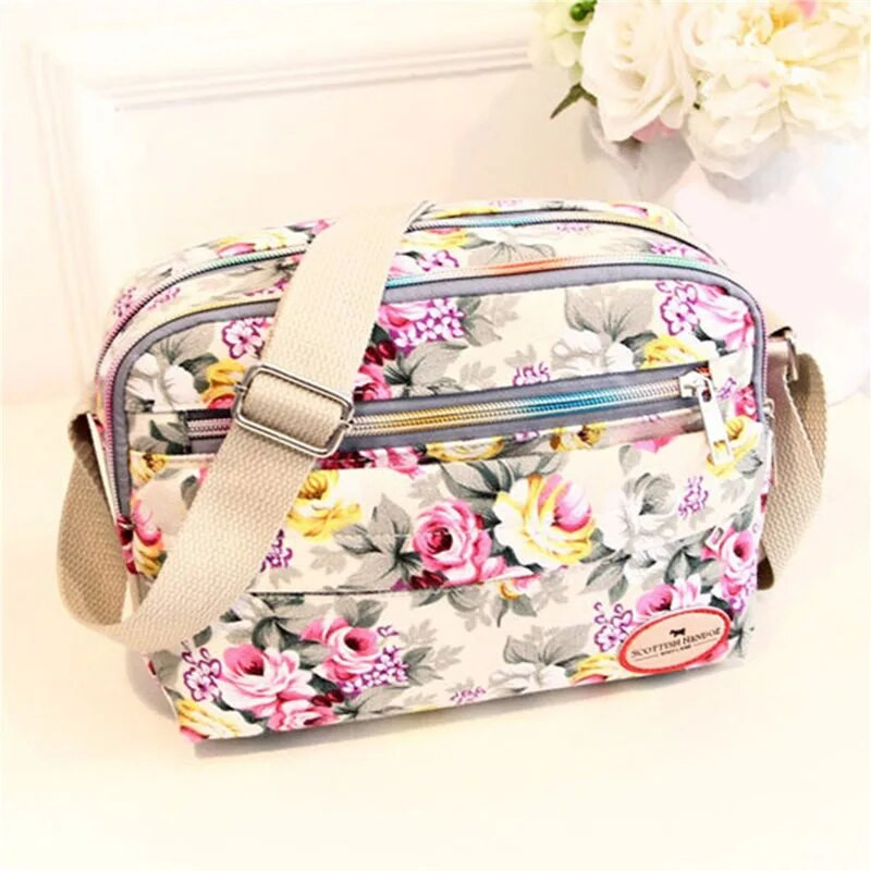 Moodne lilleline mitmevärviline prinditud lõuend Naiste käekott Trend õlakott Nailonist vabaaja kott Vanema kingitus