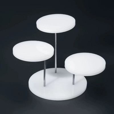 Akrüülist ümmargune tassikoogirest, ehete kooginäitus, magustoiduriiul, pulmapeo kaunistus