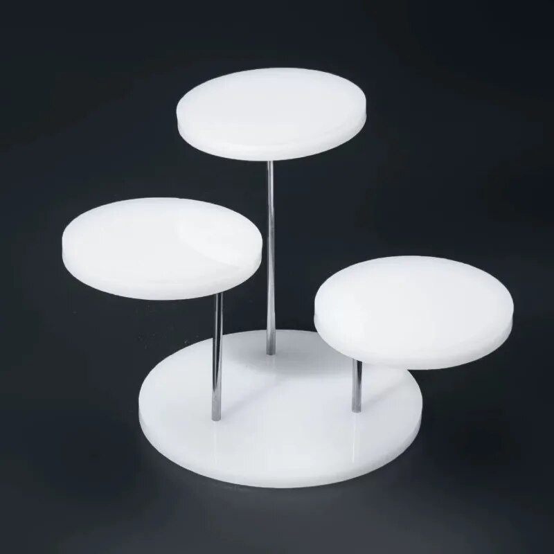 Akrüülist ümmargune tassikoogirest, ehete kooginäitus, magustoiduriiul, pulmapeo kaunistus