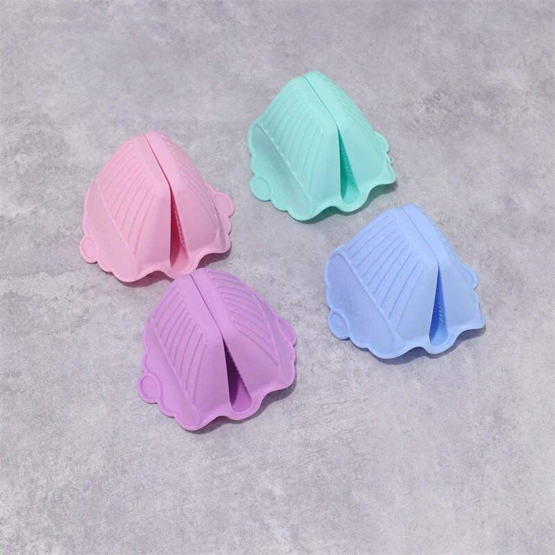 2 tk. Toidukvaliteediga köögi silikoonkindad Põletusvastased libisemisvastased sõrmeklambrid Kodumajapidamises kasutatav mikrolaineahi soojusisolatsiooni korraldaja