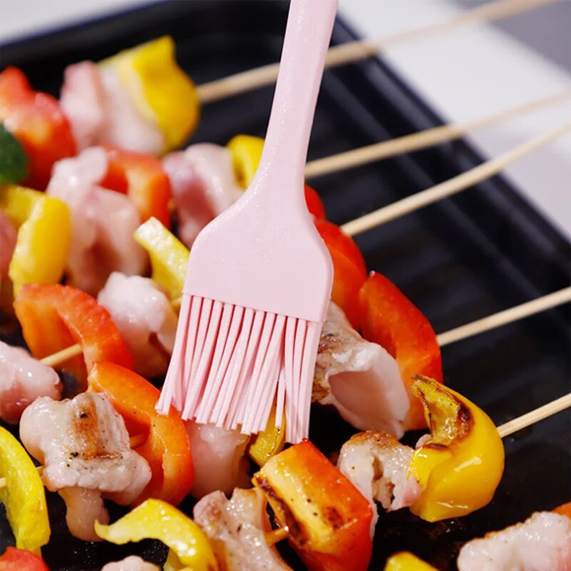 Mittenakkuv roosa silikoonlabidas ümmarguse käepidemega koogikaabits Kreem-või saiatööriistad Kõrge temperatuuriga asjad kööki