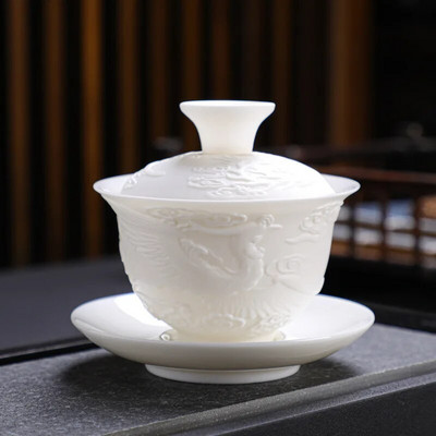 Pūķa un Fēniksa keramikas Gaiwan baltā porcelāna reljefa vāka bļoda Kung Fu tējas krūze ar vāku un apakštasīti Gaiwan Jingde Town Puer