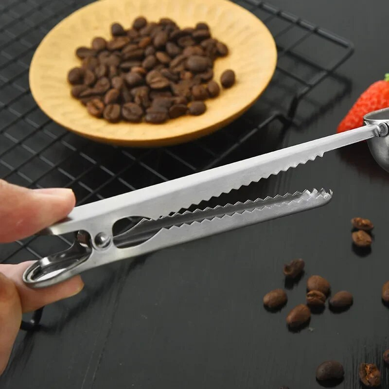 Roostevabast terasest lusikahoidja, tihendusklamber, toidu ja suupistete sulgemisklamber, kohvilusika mõõtelusikas, piimapulbri teeklamber