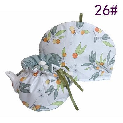 Londono keramikos arbata Cozy arbatinukui, medvilnė, šilti ir dekoratyviniai puodai, jaukūs vintažiniai gėlėmis izoliuoti, arbatos virdulio dangteliai