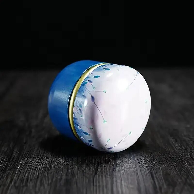 Teekarbiga plekist Caddy majapidamises kasutatav kaasaskantav suletud teepakendikarp Jaapani stiilis lilleline tee ümmargune väikesed plekkkonteinerid