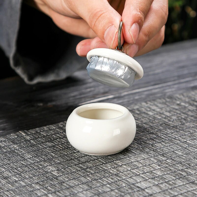 Minisuletud pott keraamiline teekoti hoiukarp Retro väike portselanpudel kaanega teemahutiga kaasaskantav hoiupaagi ornament