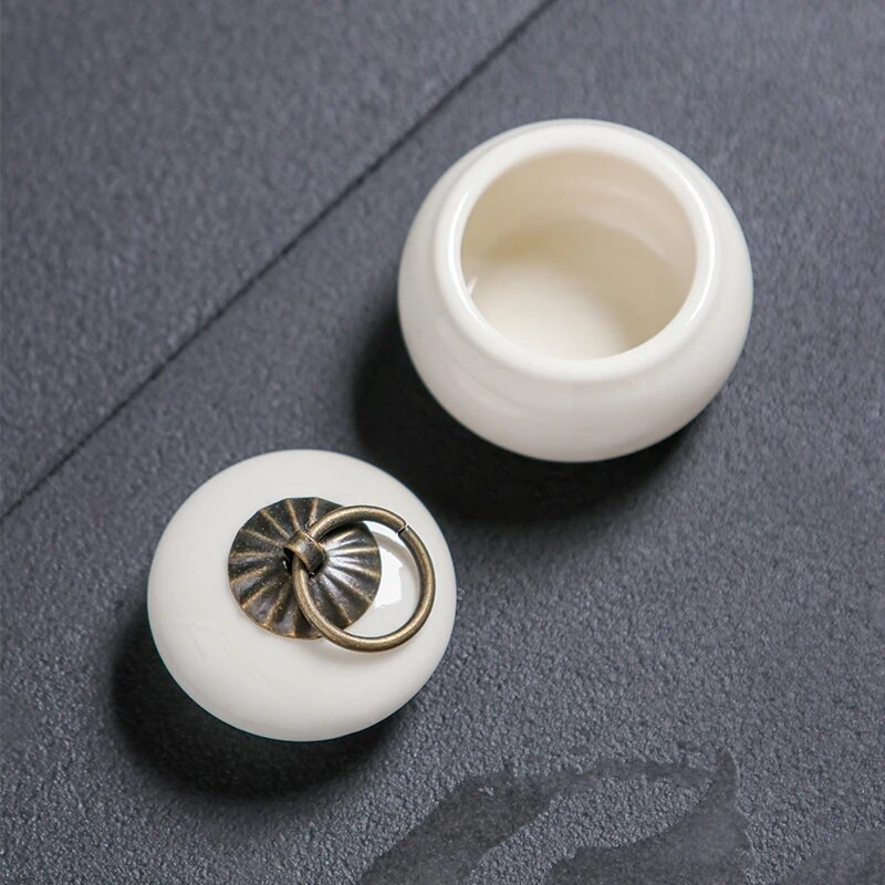 Minisuletud pott keraamiline teekoti hoiukarp Retro väike portselanpudel kaanega teemahutiga kaasaskantav hoiupaagi ornament