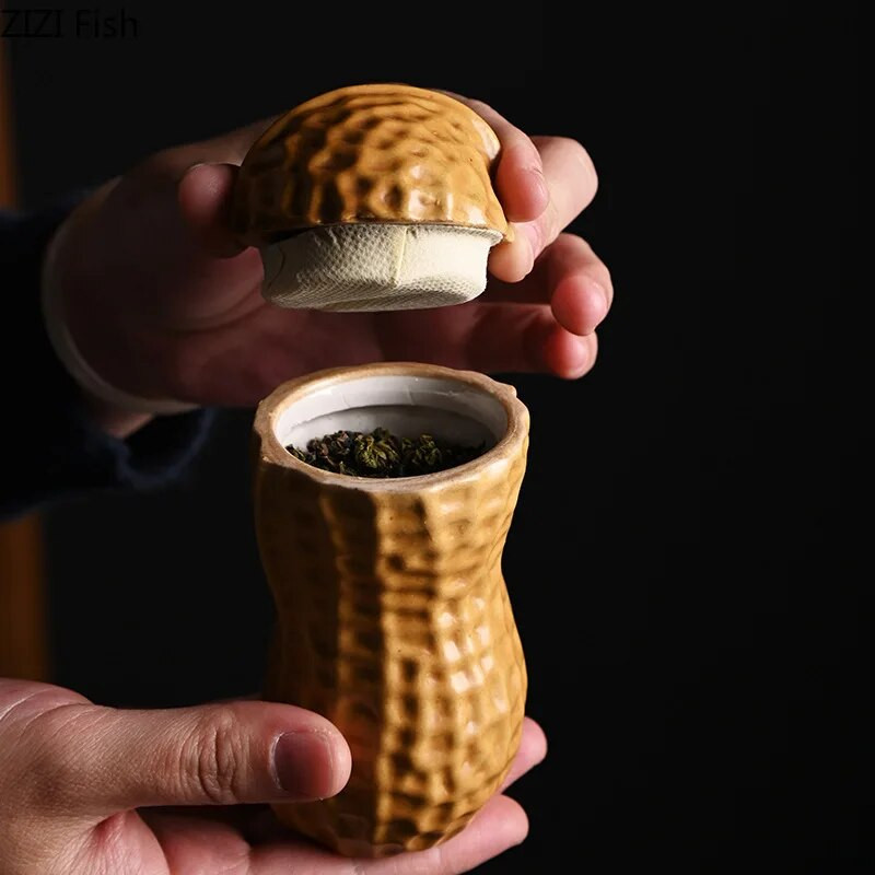 Δημιουργική απομίμηση φυστικιών κεραμικής αποθήκευσης Φορητό σφραγισμένο κουτί τσαγιού Κουζίνα καραμέλα αποξηραμένων φρούτων Διακοσμητικά αποθήκευσης καφέ Κουτί τσαγιού