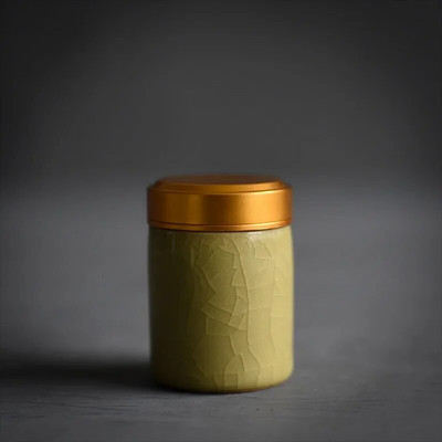 Celadoni metallist keeratava korgiga miniteepurk väike mugav reisihotell väike teekann keraamiline puuder, rouge huulepulga hoiupaak