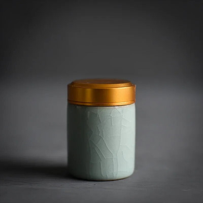 Celadoni metallist keeratava korgiga miniteepurk väike mugav reisihotell väike teekann keraamiline puuder, rouge huulepulga hoiupaak