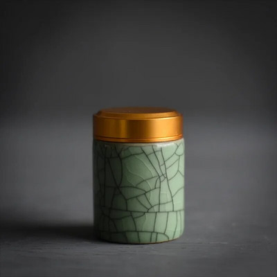 Celadoni metallist keeratava korgiga miniteepurk väike mugav reisihotell väike teekann keraamiline puuder, rouge huulepulga hoiupaak