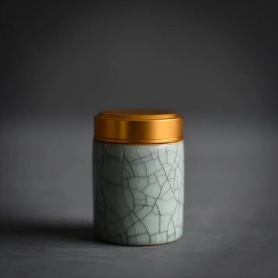 Celadoni metallist keeratava korgiga miniteepurk väike mugav reisihotell väike teekann keraamiline puuder, rouge huulepulga hoiupaak