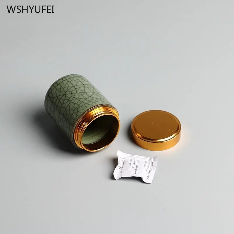 Celadoni metallist keeratava korgiga miniteepurk väike mugav reisihotell väike teekann keraamiline puuder, rouge huulepulga hoiupaak