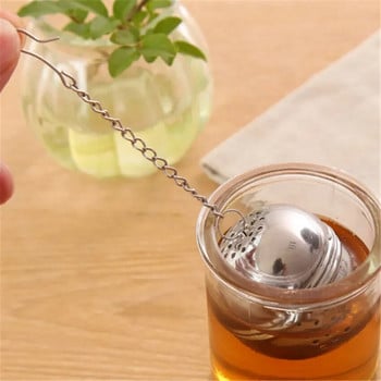 Нова топка от неръждаема стомана Tea Infuser Мрежеста филтърна цедка с кука Loose Tea Leaf Spice Ball с въжена верига Домашни кухненски инструменти