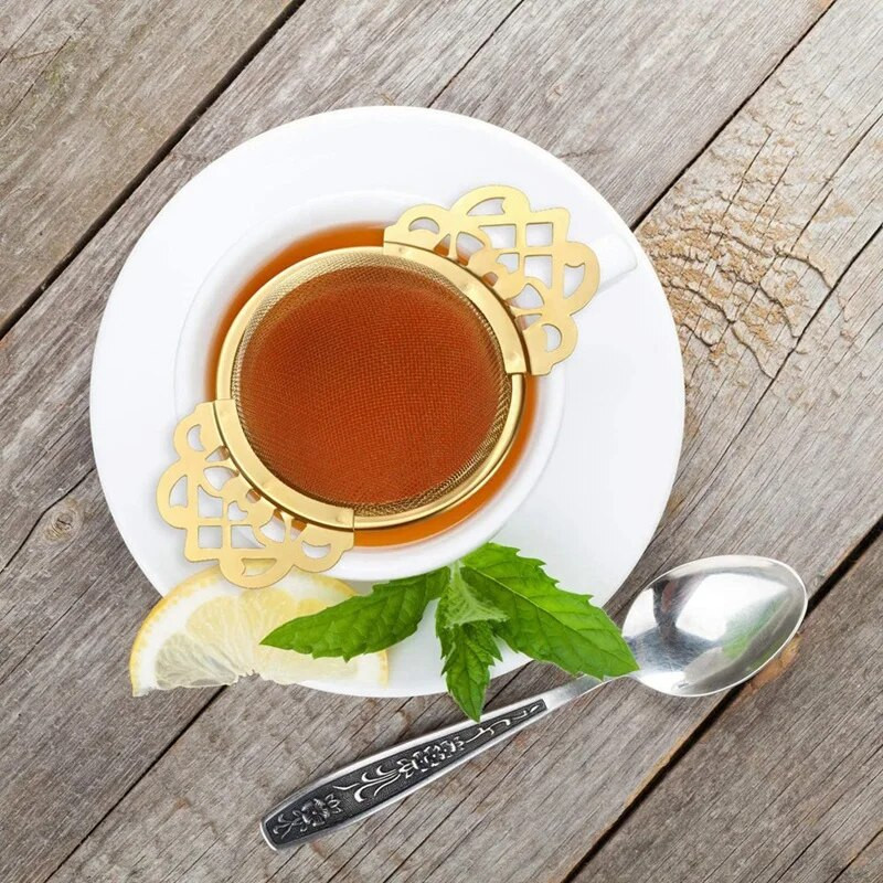 Roostevabast terasest teesõel koos tilgakausiga Lihtsalt puhastatav lahtiste lehtedega rippuv infusioonifiltri köögitööriist