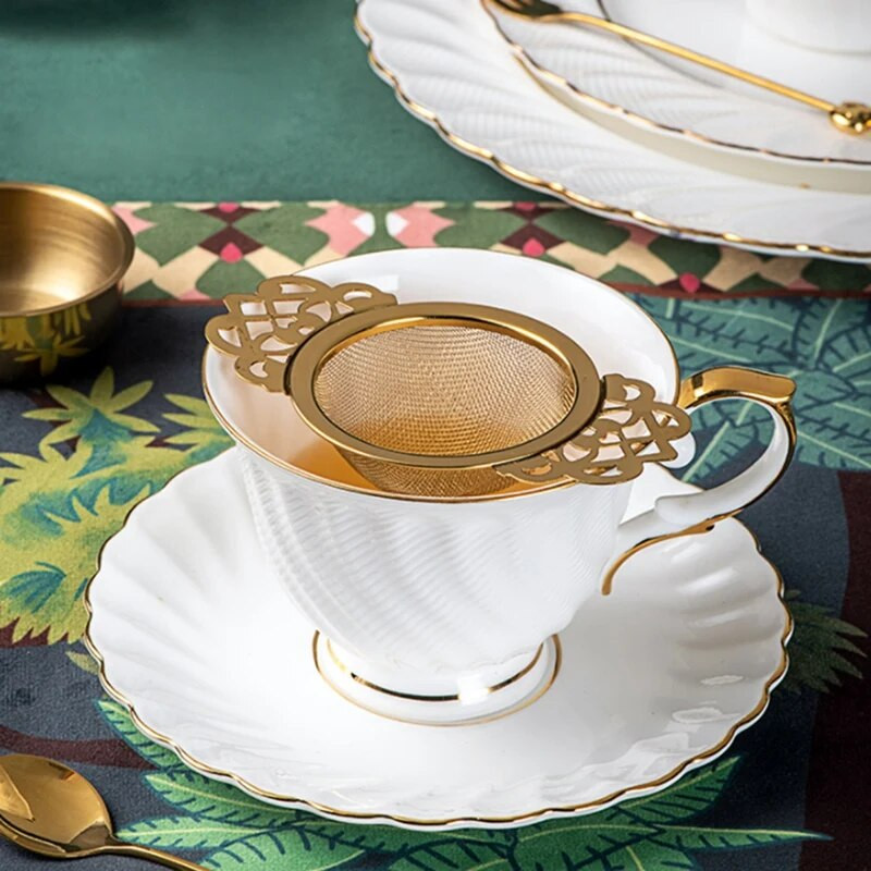 Roostevabast terasest teesõel koos tilgakausiga Lihtsalt puhastatav lahtiste lehtedega rippuv infusioonifiltri köögitööriist