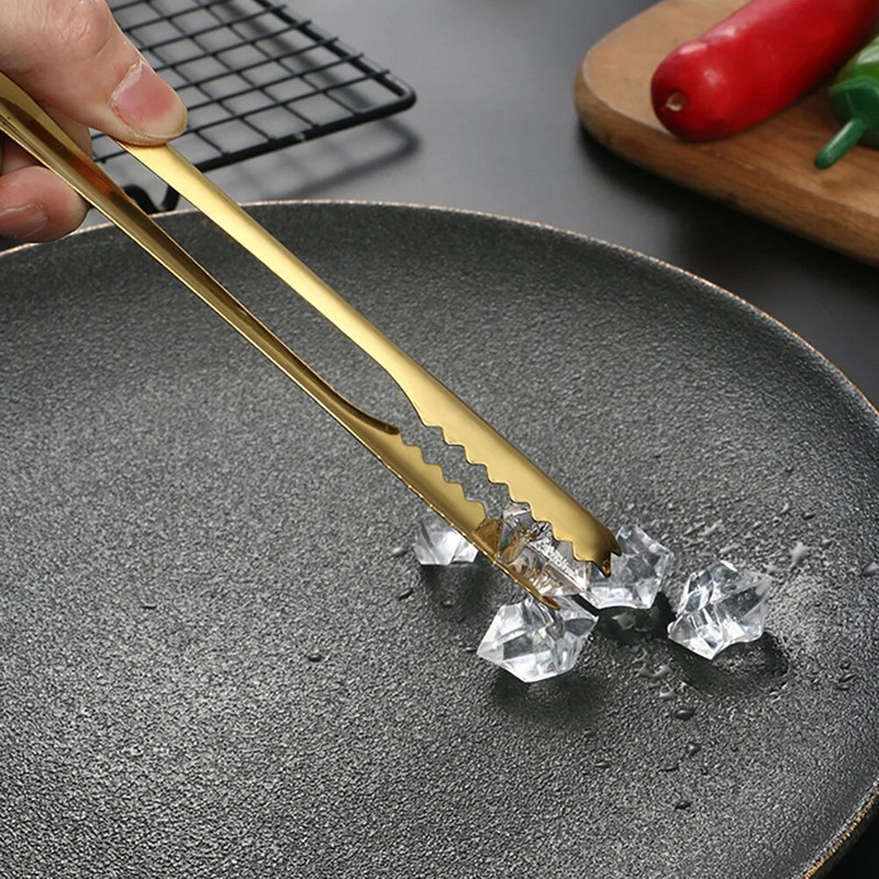 1vnt. Virtuvės įrankis, nerūdijančio plieno žnyplės, skirtos kepsninei vakarėliui, kepsninės spaustukas, duona, maistas, ledo spaustukas, ledo žnyplė, kepimo reikmenys