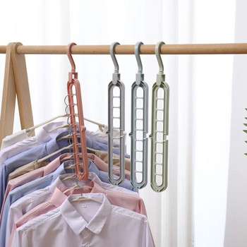 Магически многопортови поддържащи закачалки за дрехи Спестяваща място сушилня Многофункционален пластмасов органайзер за гардероб Поставка за дрехи
