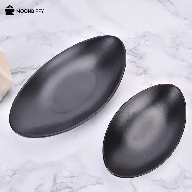 Szállodai asztali edények ovális matt fekete edények ékszertálca uzsonna tenger gyümölcsei sushi tányér oldaltányér Platos طاولات الطعام тарелки для еды