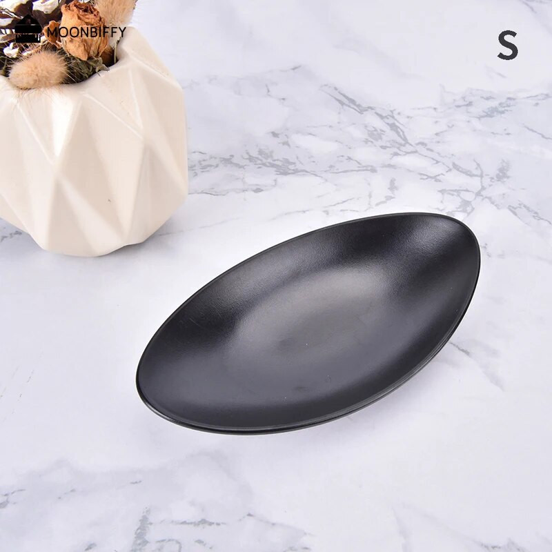 Szállodai asztali edények ovális matt fekete edények ékszertálca uzsonna tenger gyümölcsei sushi tányér oldaltányér Platos طاولات الطعام тарелки для еды