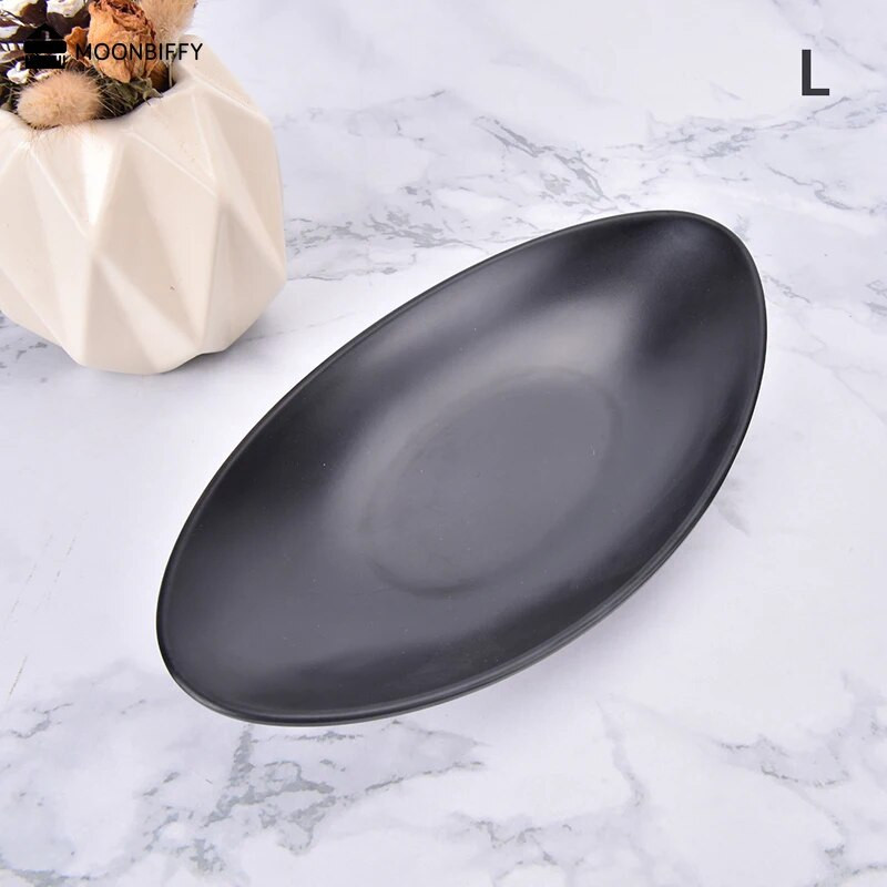 Szállodai asztali edények ovális matt fekete edények ékszertálca uzsonna tenger gyümölcsei sushi tányér oldaltányér Platos طاولات الطعام тарелки для еды
