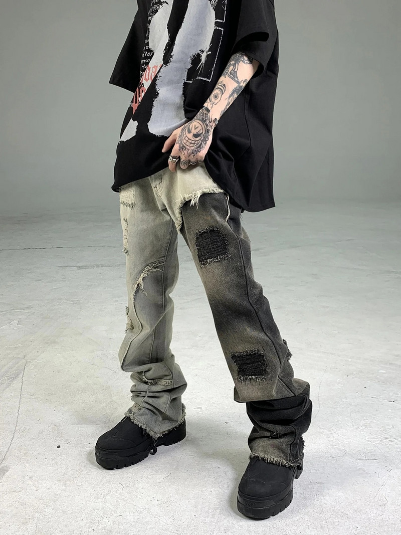 Pán Black, avantgardný a špičkový dizajn, heterochromatické šitie, otrhané žobrácke nohavice s mierne volánikovými okrajmi a