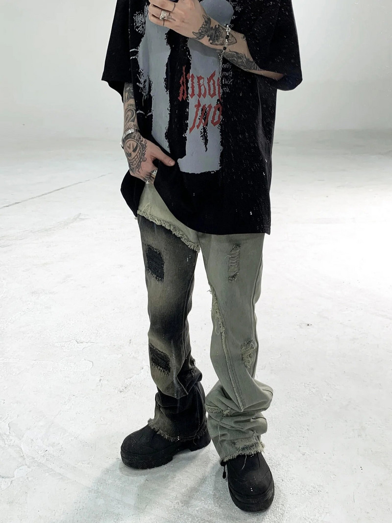 Pán Black, avantgardný a špičkový dizajn, heterochromatické šitie, otrhané žobrácke nohavice s mierne volánikovými okrajmi a