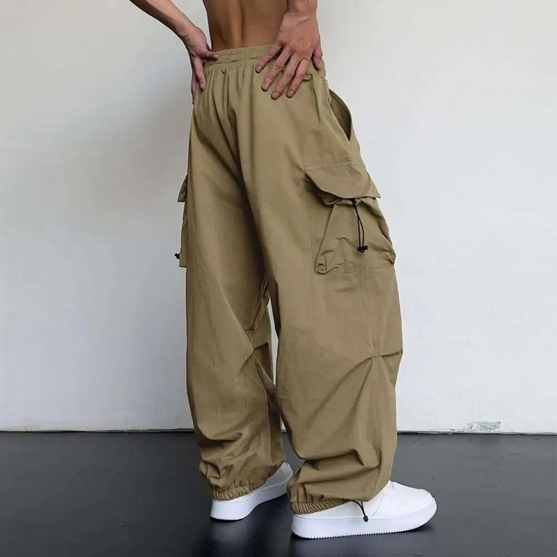 Laisvos kelnės, didelės kelių kišenių vyriškos krovininės kelnės su elastingomis aukštu juosmeniu, giliai tarpkoju, minkštu, kvėpuojančiu klubu, surištomis kulkšnies juostele