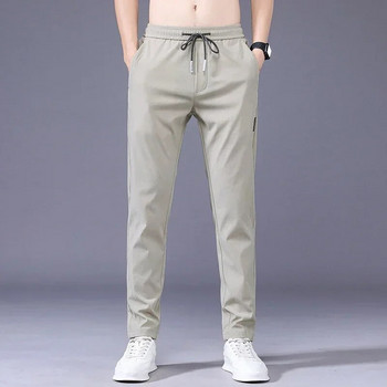 Φθινοπωρινό νέο ανδρικό παντελόνι για τζόκινγκ ψηλό ελαστικό λεπτό ίσιο κορεάτικο παντελόνι με κορδόνια γκρι μαύρο χακί παντελόνι