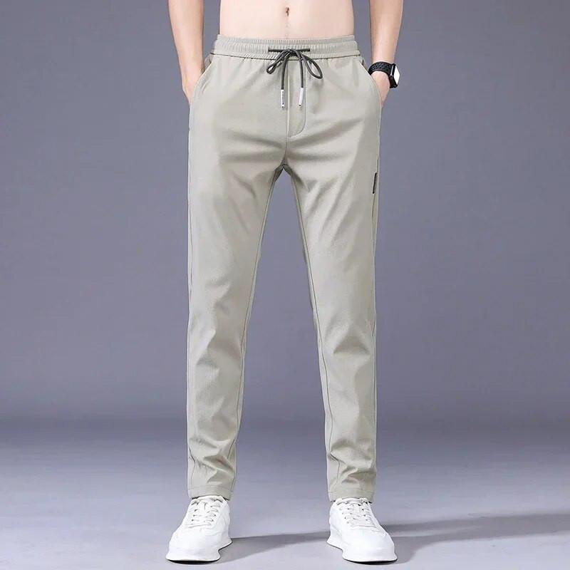 Pantaloni de jogging casual pentru bărbați noi de toamnă, cu elastic înalt, subțiri, drepti, de modă coreeană, pantaloni de sport cu șnur, gri, negru, kaki