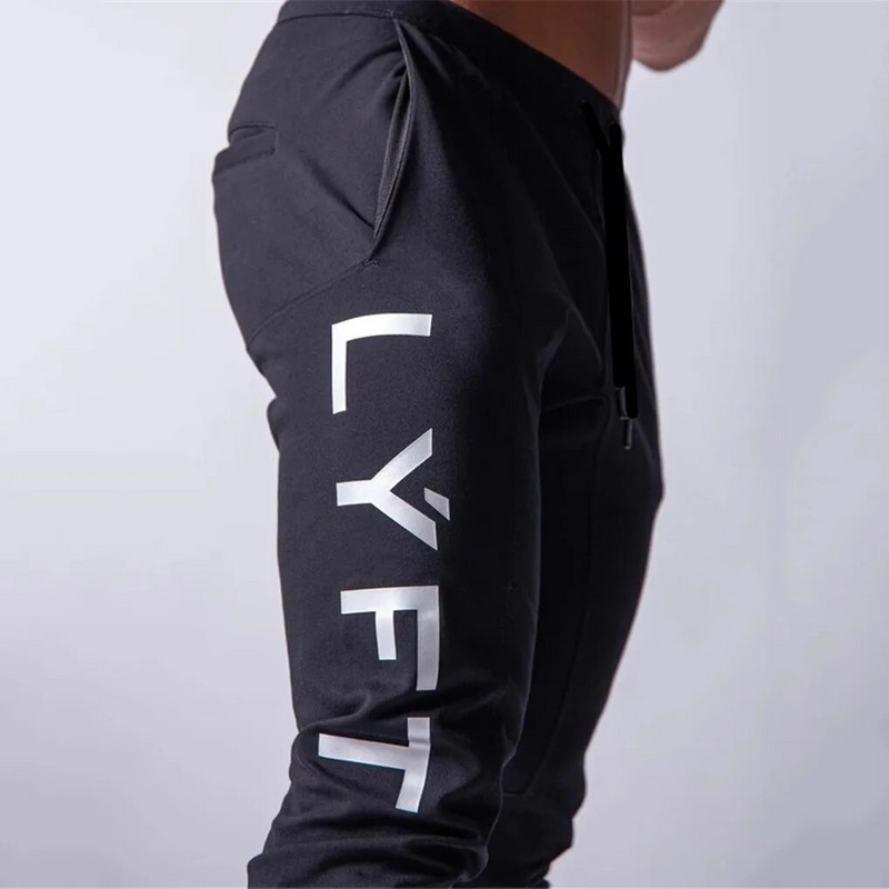 Sporto kelnės Vyriškos pavasario ir rudens sportinės laisvalaikio kelnės Ilgos vienspalvės kelnės Devynių taškų bėgimo laisvos kelnės