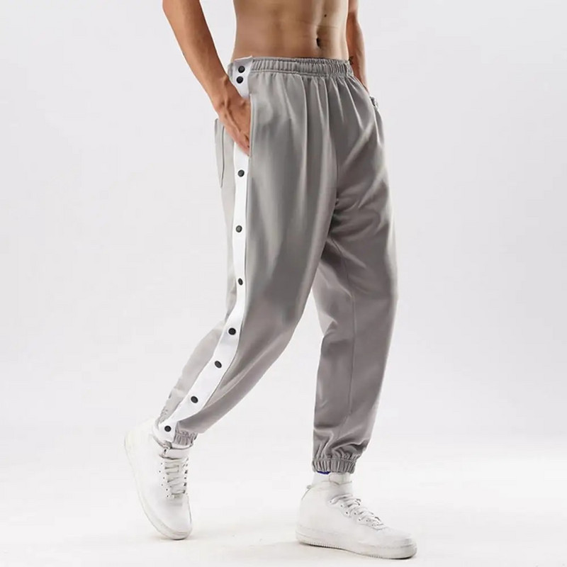 Îmbrăcăminte sport ocazională Pantaloni de jogging Pantaloni rupți cu butoane Pantaloni de sport de antrenament de baschet cu buzunare Roupas Masculinas