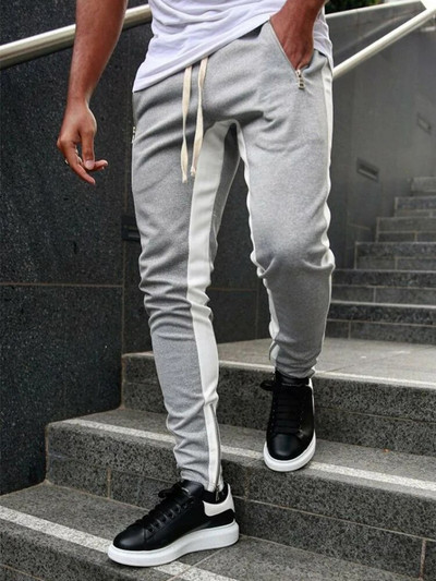 Toamnă Iarnă Pantaloni de sport noi din bumbac pentru bărbați Pantaloni de fitness pentru bărbați Îmbrăcăminte sportivă pentru bărbați Joggeri de modă ocazional Pantaloni de antrenament Pantaloni de antrenament