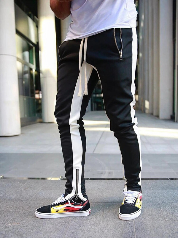 Toamnă Iarnă Pantaloni de sport noi din bumbac pentru bărbați Pantaloni de fitness pentru bărbați Îmbrăcăminte sportivă pentru bărbați Joggeri de modă ocazional Pantaloni de antrenament Pantaloni de antrenament