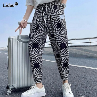 Pánske oblečenie 2023 Módne voľné elastické pásy Jednoduchosť Pekné potlačené pruhované jarné letné tenké pohodlné ležérne nohavice