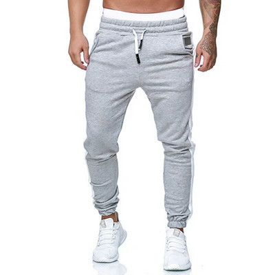 Pantaloni casual pentru bărbați de primăvară Îmbrăcăminte sport subțire Pantaloni skinny Treninguri uni Pantaloni de trening Hip Hop Streetwear Joggeri Pantaloni de trening