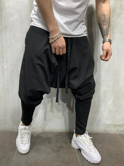 Мъжко облекло 2022 г. Мъжки панталони с нови хип-хоп тенденции Европейски американски свободни едноцветни крака Улични спортни ежедневни харем панталони