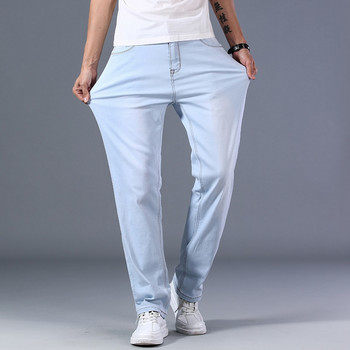Плюс размер 40 42 44 Мъжки светлосини дънки Пролет и лято Свободни прави Усъвършенствани еластични тънки дънкови панталони Мъжки маркови дрехи