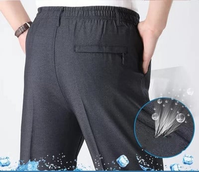 Pánske letné nohavice, elastické a módne klasické jednofarebné vrecká na zips, tepláky, oblek, dlhé ležérne vintage nohavice