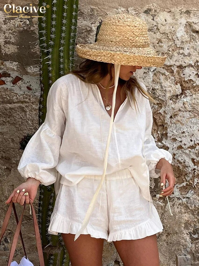 Clacive Seturi de 2 piese din bumbac alb, lejer, lejer, ținută pentru femei, cămașă elegantă cu mâneci bufante, cu șireturi, cu talie înaltă, set de pantaloni scurți cu volane
