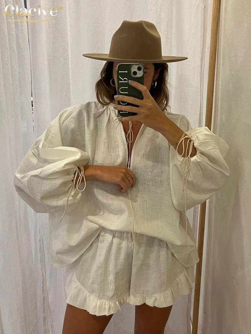 Clacive Seturi de 2 piese din bumbac alb, lejer, lejer, ținută pentru femei, cămașă elegantă cu mâneci bufante, cu șireturi, cu talie înaltă, set de pantaloni scurți cu volane
