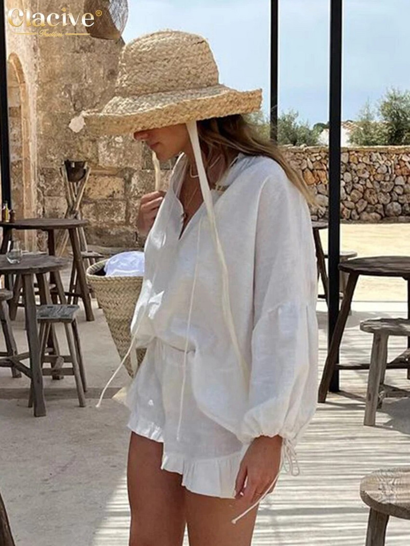 Clacive Seturi de 2 piese din bumbac alb, lejer, lejer, ținută pentru femei, cămașă elegantă cu mâneci bufante, cu șireturi, cu talie înaltă, set de pantaloni scurți cu volane