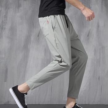 Καλό μολύβι παντελόνι από μαλακό ύφασμα ανδρικό ένατο παντελόνι Κορδόνι απλού χαλαρού τύπου Καλοκαιρινό παντελόνι με πολλές τσέπες